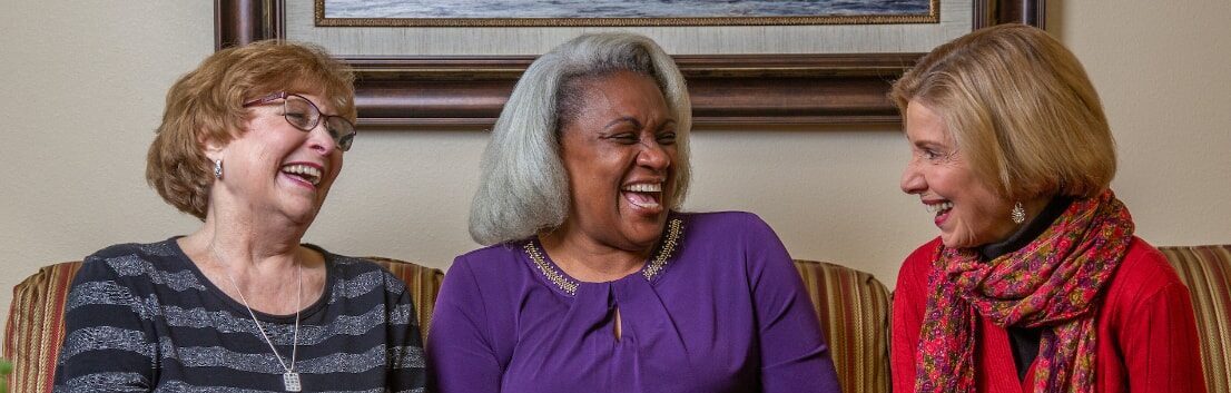 Residents laughing together at Chesterfield Heights